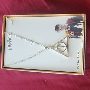 Harry potter necklace (deathly hallows) new in box never worn